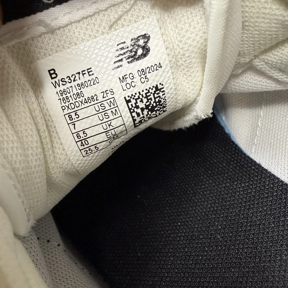 New Balance smoke signs